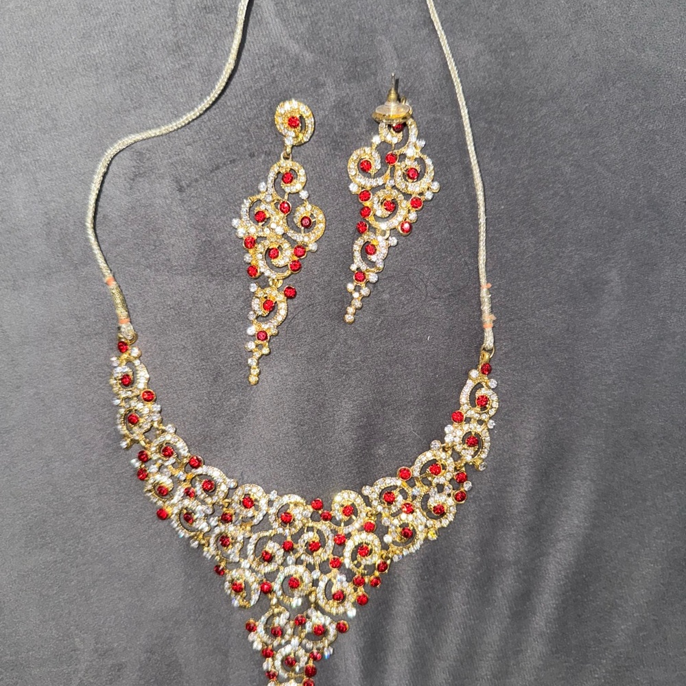 Gold and Red Necklace Set with Intricate Detailing